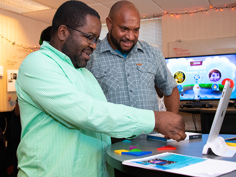 Faculty and staff in the lab