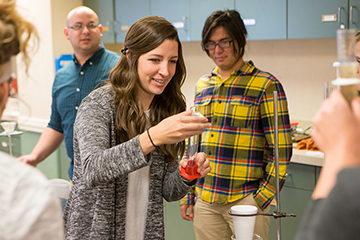 Teacher and students in the lab