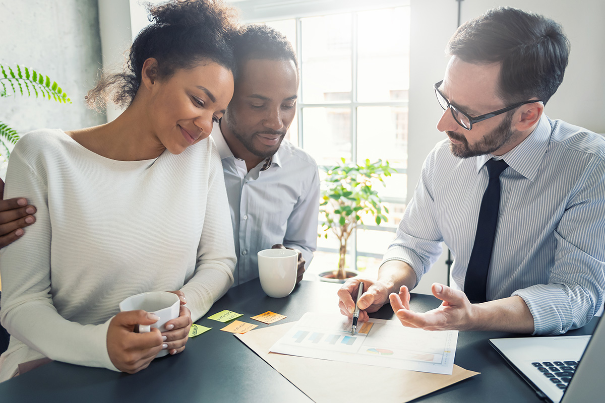Financial planner working with clients