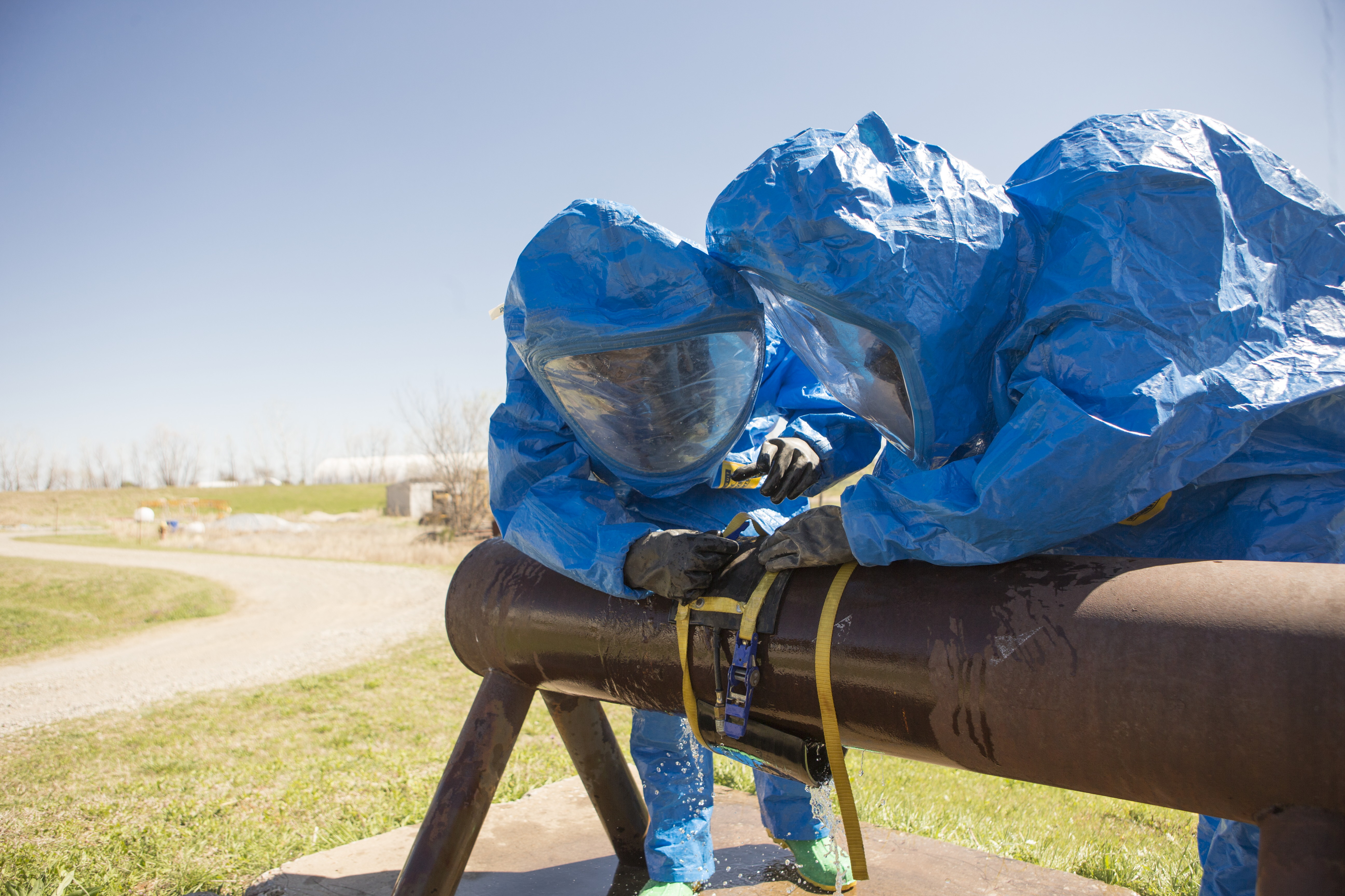 Firefighters in Hazmat suits