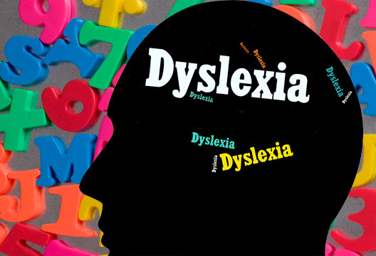 sihoulette of head with the word dyslexia 